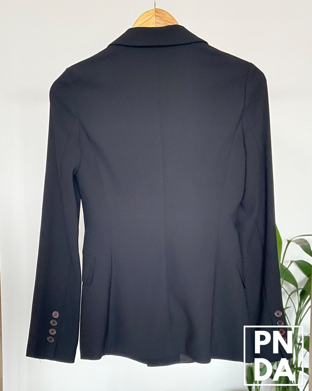 Blazer negro UNE